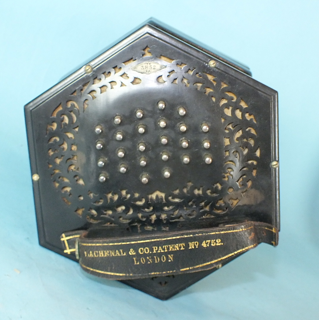 A Lachenal & Co. concertina with pierced ebonised ends, 56 chrome keys and sevenfold bellows, - Image 2 of 5