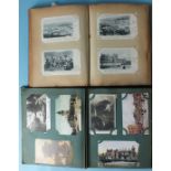 Two albums containing approximately 230 postcards, early-20th century, mainly topographical.