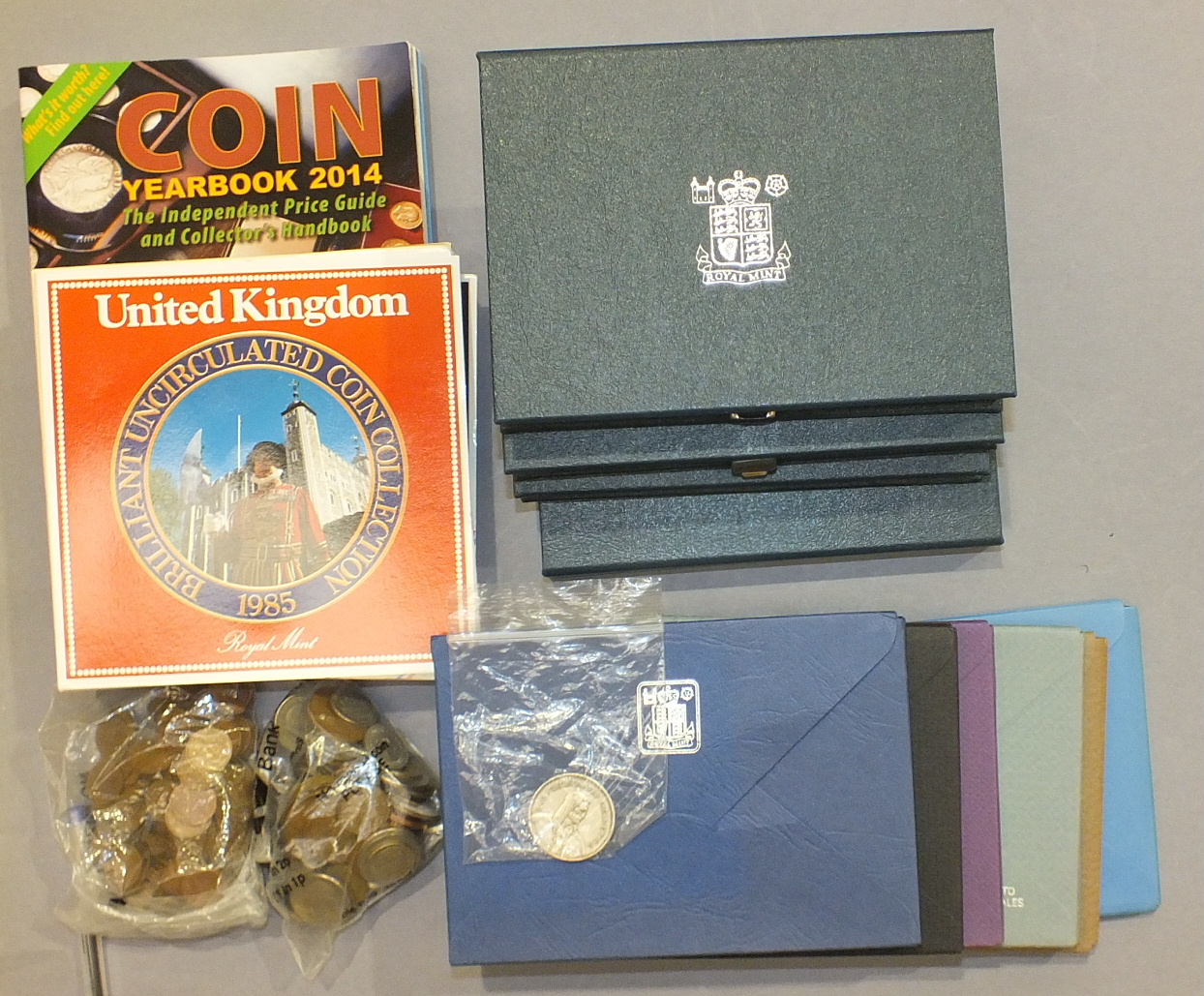 A collection of Royal Mint proof coin sets: 1977, 78, 79, 80, 81, 82, 83, 4, 5, 6, Royal Mint BU