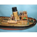 A plastic and wooden constructed model of the twin-screw harbour tug boat 'Imara, Dar-Es-Salaam',