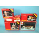 A quantity of OO gauge railway buildings, track and trackside accessories, mainly playworn.