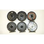 Two Intrepid Rimfly fly reels with spare spools and two other fly reels.