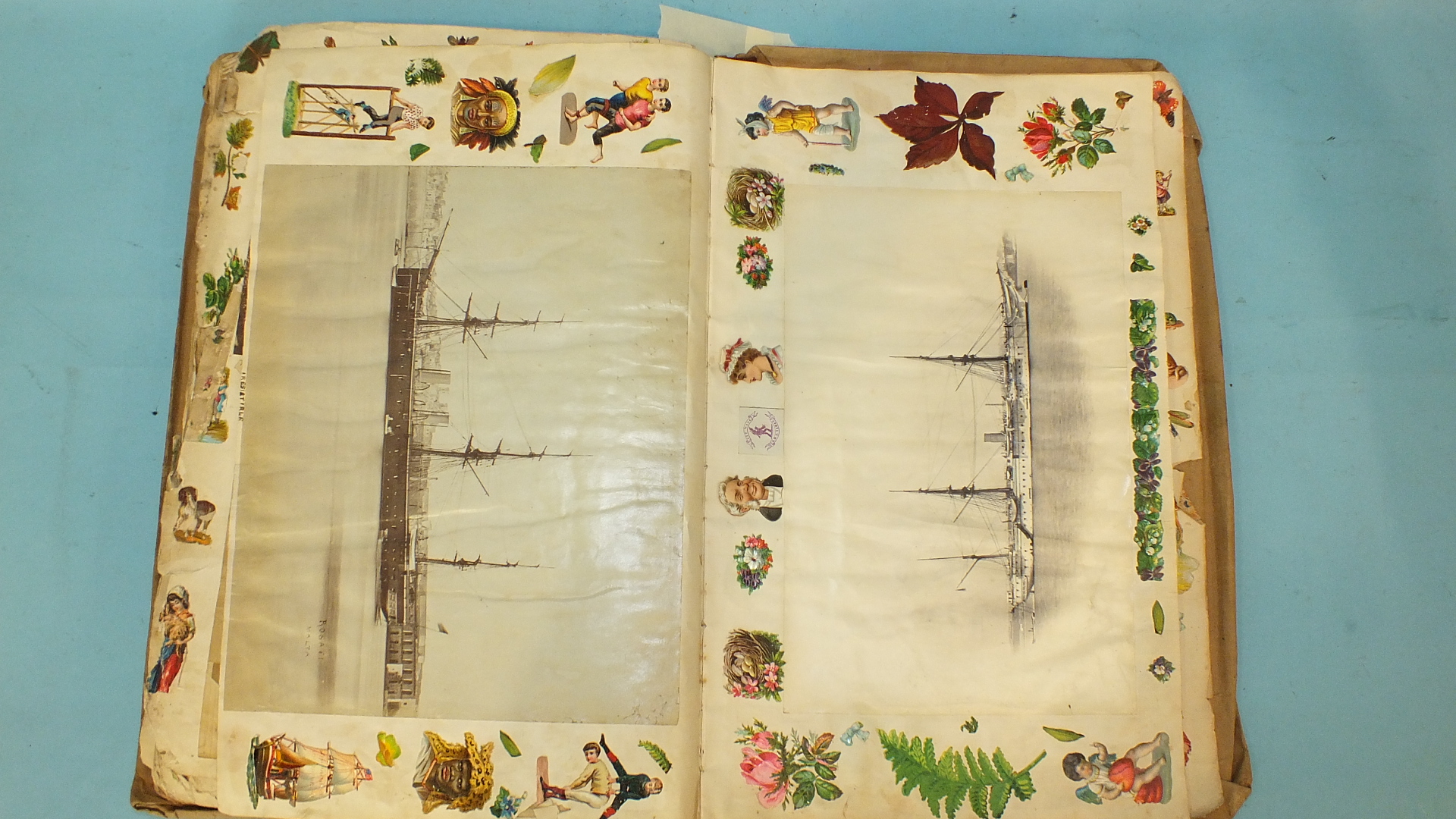 A Victorian album full of scraps, chromo-lithographs, a few photos of ships and greetings cards, - Image 2 of 5