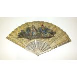 An 18th century fan, the guards and sticks carved and heightened in gold and silver, the chicken