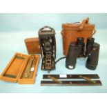 A pair of military issue 7x50 Canadian Navy binoculars marked 'CGB 40 MA 7x50 24509-C REL/CANADA