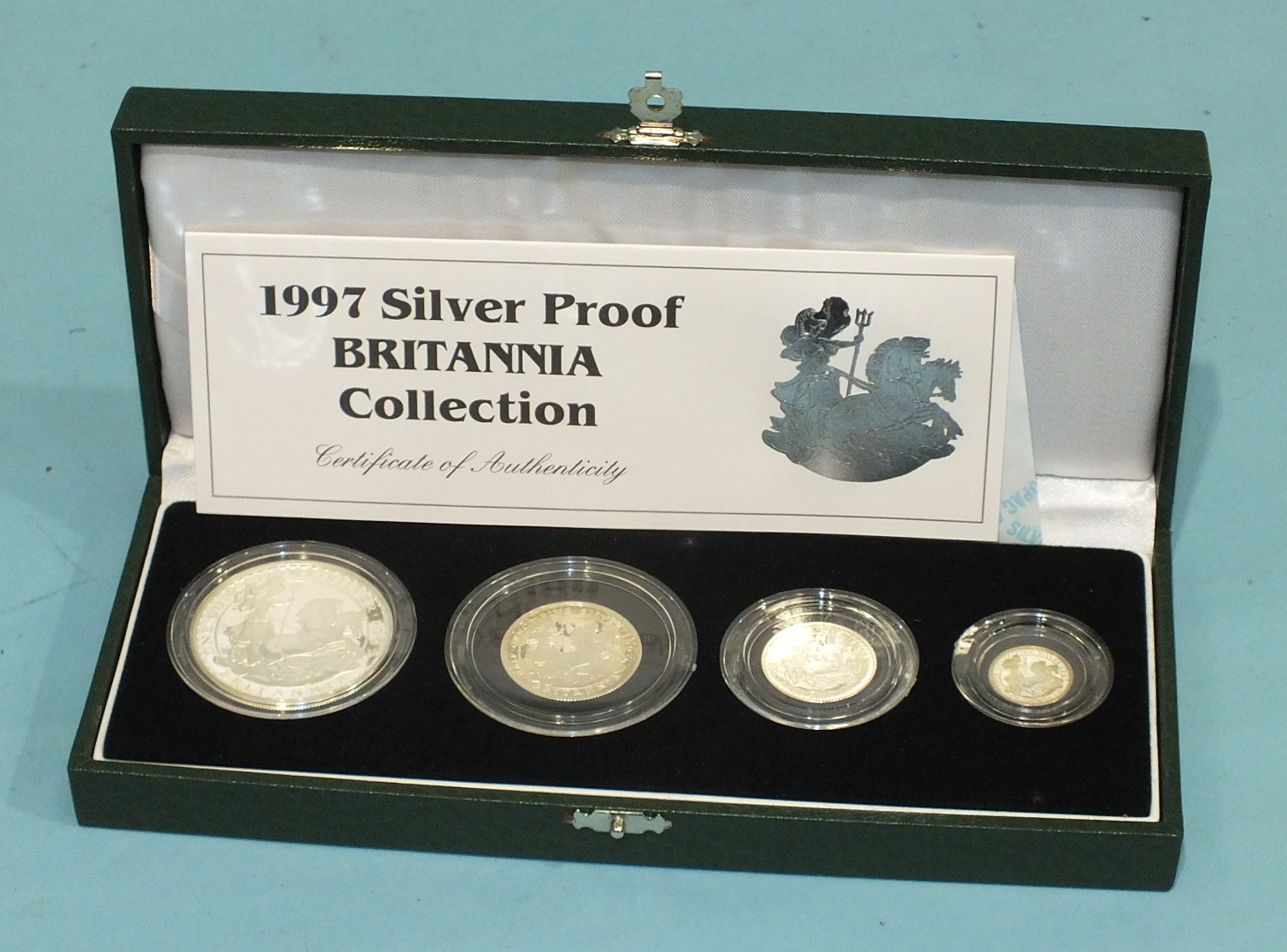 A Royal Mint 1997 silver proof 'Britannia' four-coin collection in presentation case, with COA and