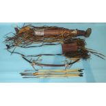 A 20th century African tribal bow, arrows and pouch constructed of leather.
