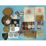 A family group of WWII medals: 1939-45 and Burma Stars, Defence and 1939-45 War Medals, with