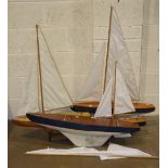 Four modern wooden hull pond yachts, 92cm, 77cm, 67cm and 46cm long, (4).