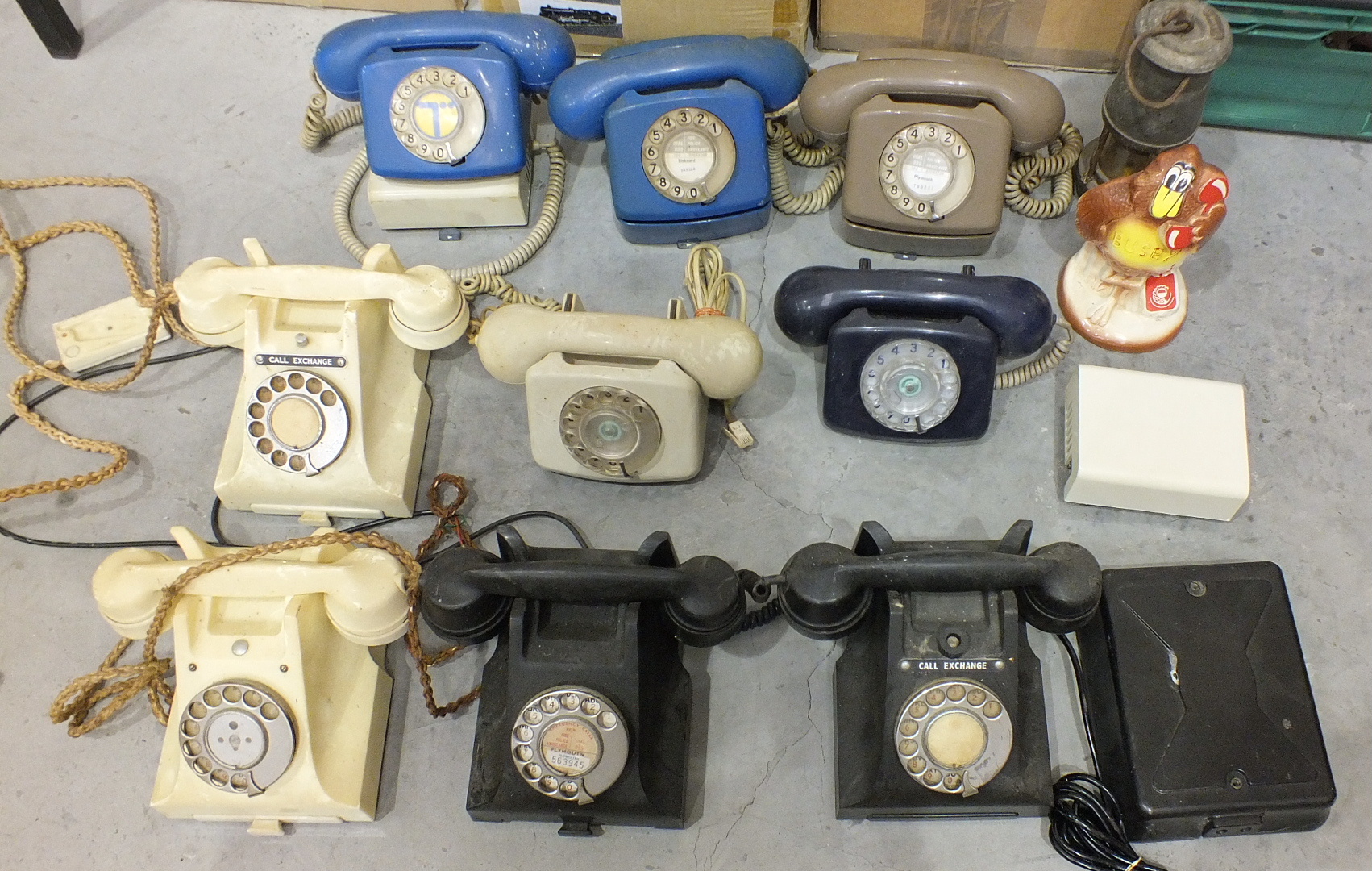 A collection of nine vintage GPO Bakelite telephones, including 332L, 312L, 312F (x2), etc.