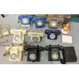 A collection of nine vintage GPO Bakelite telephones, including 332L, 312L, 312F (x2), etc.