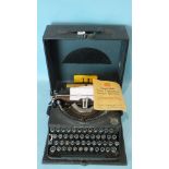 An Imperial 'The Good Companion' portable typewriter with instruction book and accessories, cased.