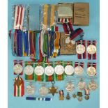 Three WWII medals in glassine envelopes and OHMS box, unnamed, a WWII pair in OHMS box for Mr F E