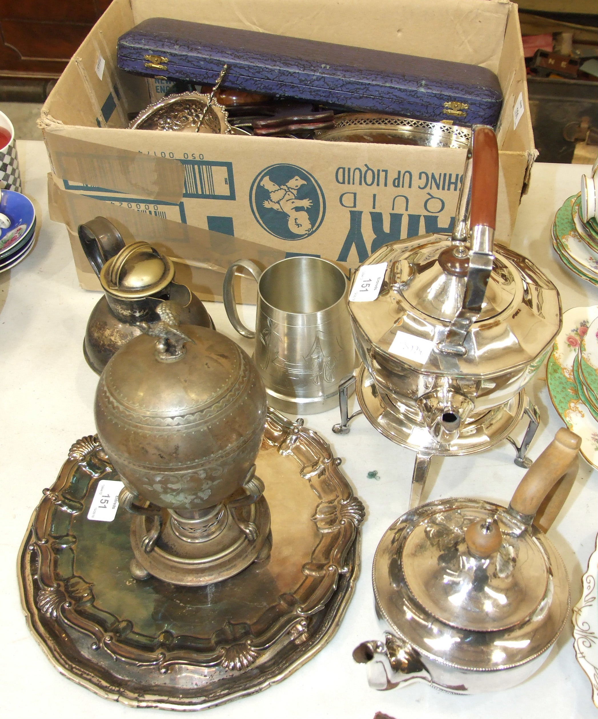 A plated spirit kettle on stand, a collection of plated cutlery and other plated ware.