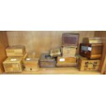 A collection of wooden novelty cigarette boxes, many with parquetry decoration.
