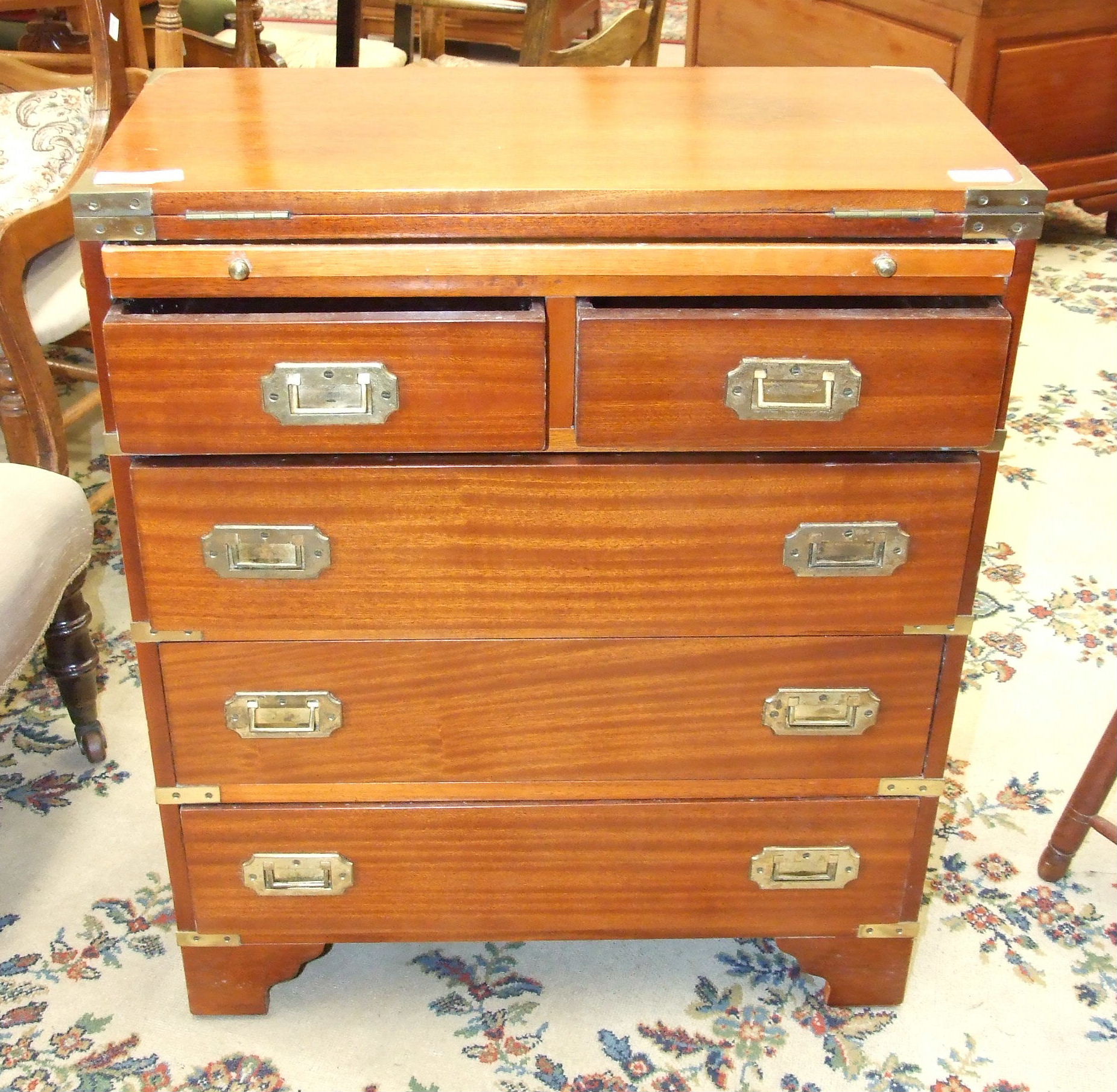 A modern military-style brass-bound bachelor's chest, 62cm wide.