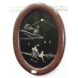 A pair of early-20th century Japanese lacquered and mother-of-pearl wall plaques, in oval frames, (