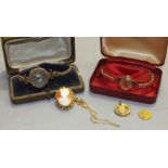 A shell cameo brooch/pendant on 9ct gold neck chain, a ladies 9ct-gold-cased wrist watch, (a/f),