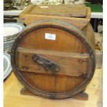 A late-19th/early-20th century wooden table top butter churn, 39cm high, 33cm diameter.