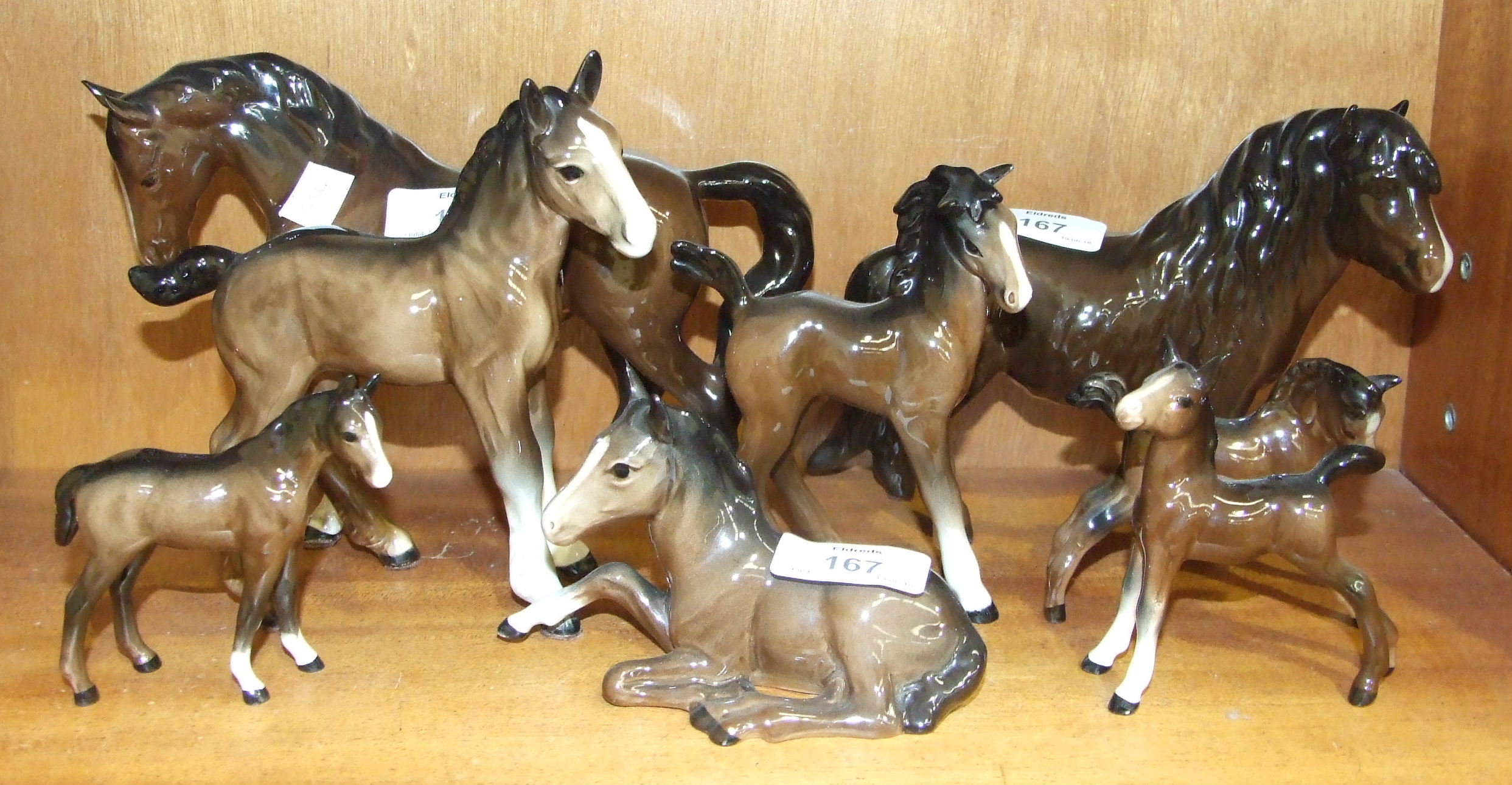 A collection of eight Beswick horses, including: 'Stocky Jogging Mare', third version, 'Shetland