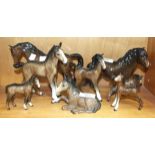 A collection of eight Beswick horses, including: 'Stocky Jogging Mare', third version, 'Shetland