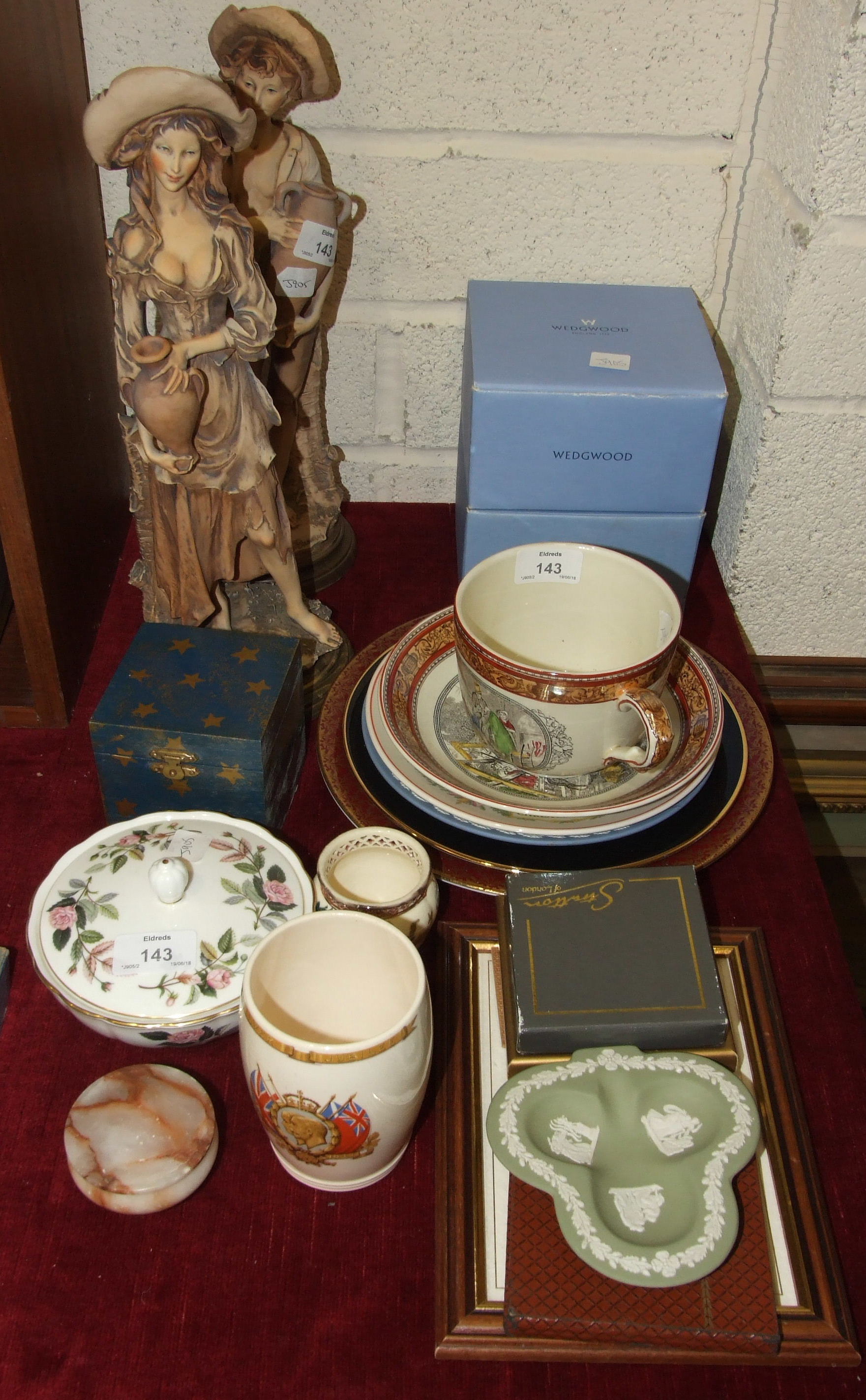 A large Adams cup and saucer with transfer-printed scenes from Oliver Twist, Wedgwood and other