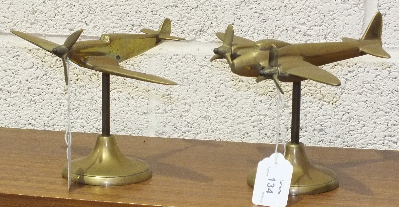 A brass Spitfire desk stand, 15cm high and another of a Mosquito aeroplane, 16cm high, (2).