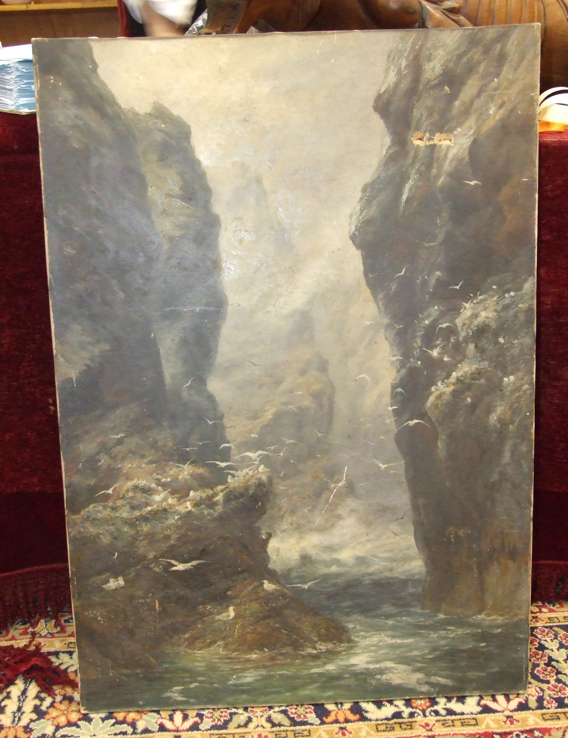 A 19th century oil on canvas painting depicting sea birds resting on a rocky cliff, indistinct - Image 2 of 2