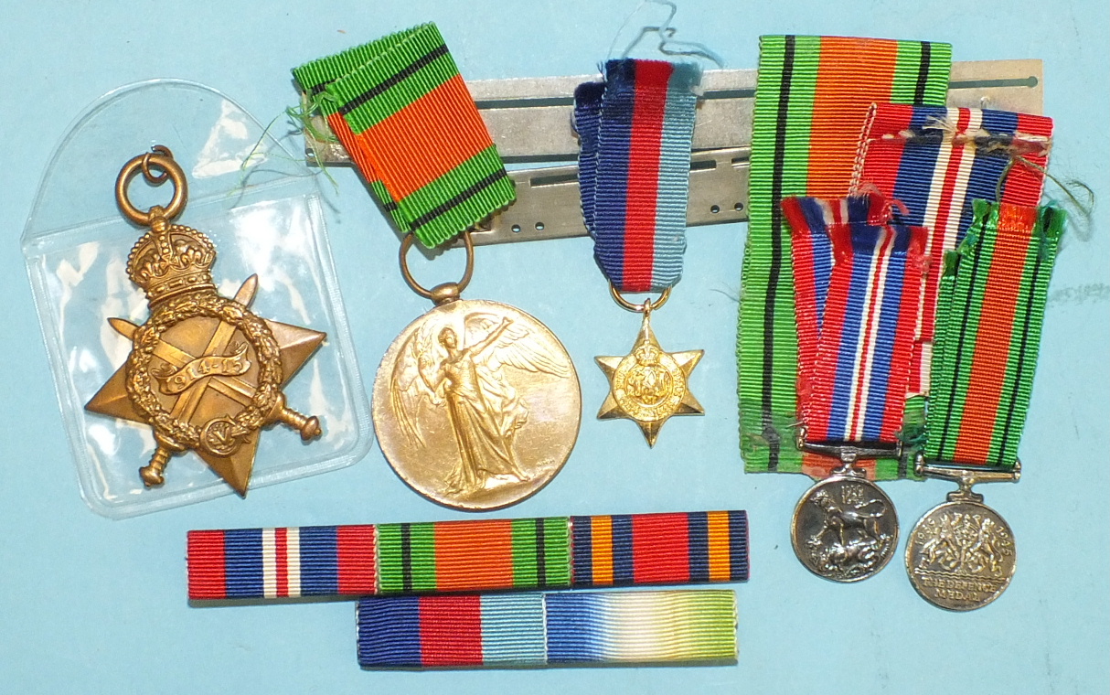 A WWI Victory Medal, a 1914-15 Star, (different recipients), three WWII miniatures, various ribbons,