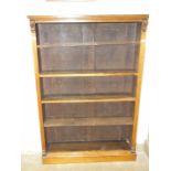 An early-20th century mahogany open bookshelf with adjustable shelves, on plinth base, 104.5cm wide,