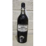 Cockburns 1963 Vintage Port, cork slightly raised, 1 bottle.