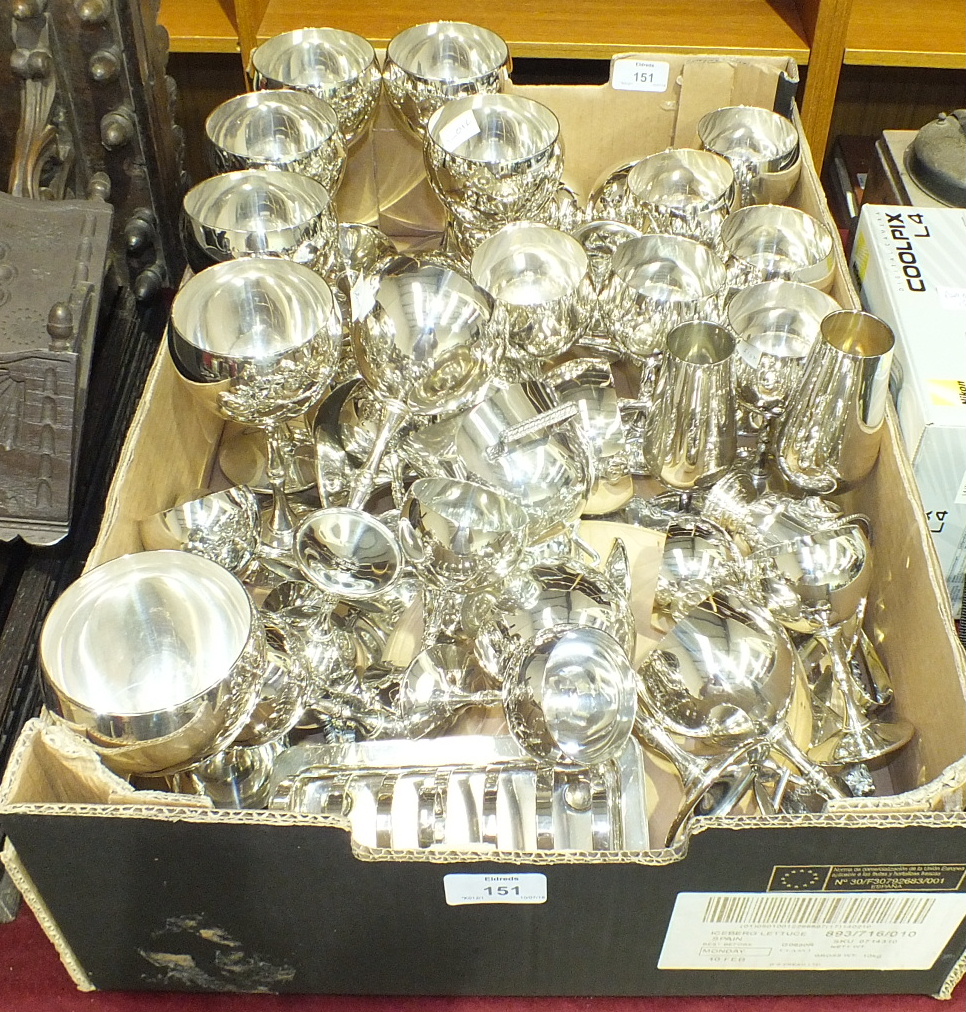 A collection of Valero silver-plated goblets, a plated and wooden bread board and other plated