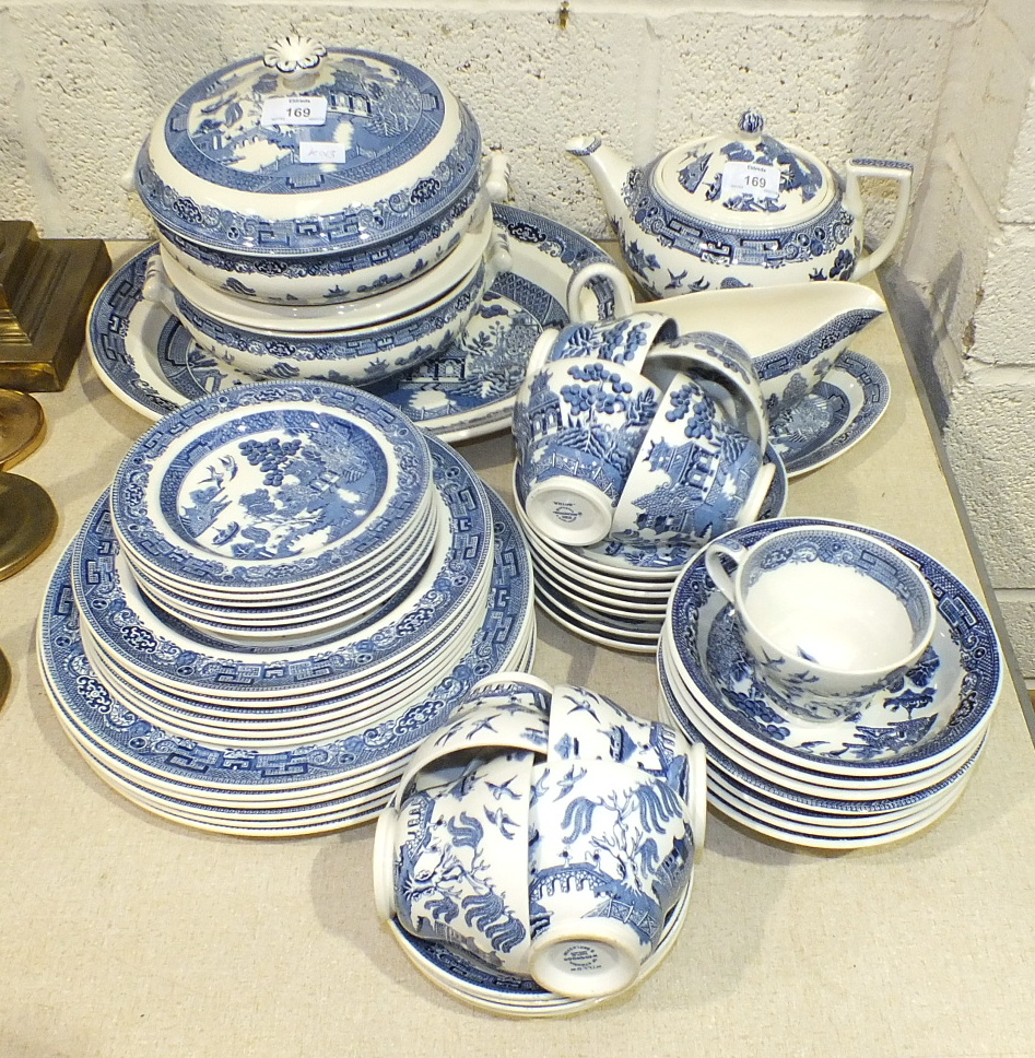 Approximately fifty pieces of Wedgwood blue and white 'Willow' pattern tea and dinner ware.