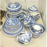 Approximately fifty pieces of Wedgwood blue and white 'Willow' pattern tea and dinner ware.