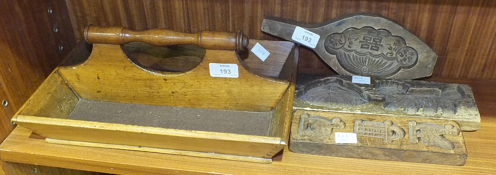 A treen two-division cutlery tray with turned carrying handle, 35.5 x 23cm and three wooden butter