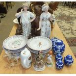 A pair of painted parian ware figures of a young lady and gentleman, 45cm high, (a/f) and other