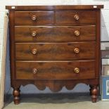 A Late-Victorian mahogany bow-front chest of two short and three long drawers, on turned legs, 122cm