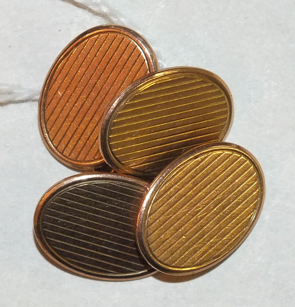 A pair of 9ct gold oval cufflinks, 10.3g.