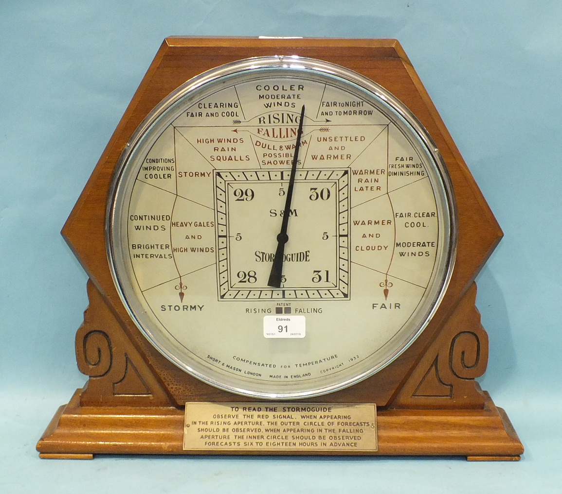 A Short & Mason 'Stormguide' Art Deco barometer, the circular barometer with a silvered dial and