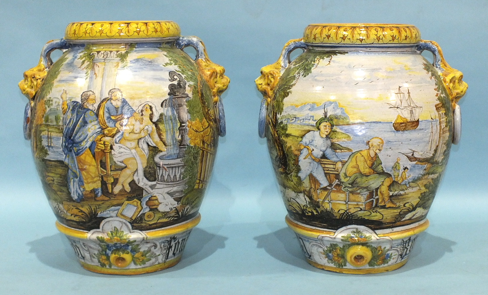 A large pair of Italian Faïence majolica jars in the 16th century style, one decorated with