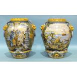 A large pair of Italian Faïence majolica jars in the 16th century style, one decorated with