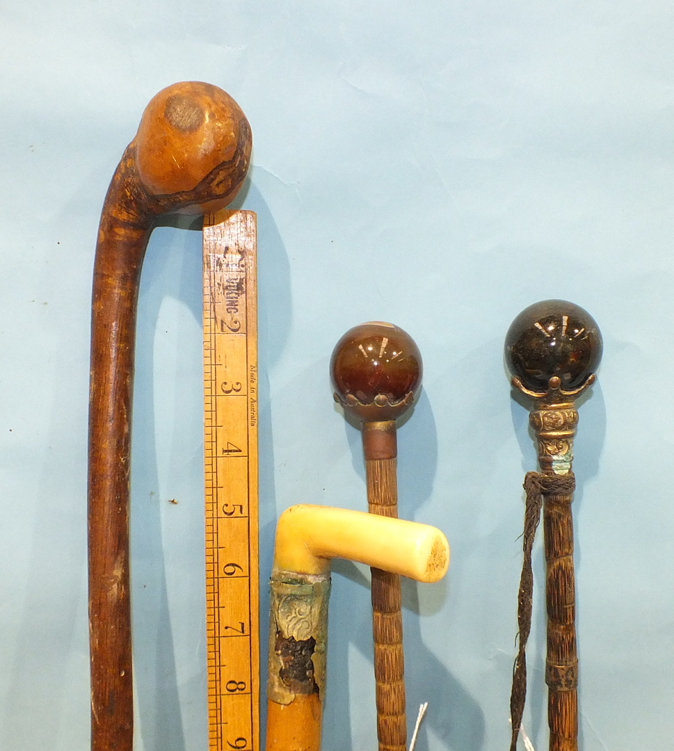 Two Late-Victorian umbrellas with gilt metal and agate ball handles and other sticks. - Image 3 of 3