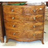 An early 19th century mahogany bow-fronted chest of two short and three long cockbeaded drawers on