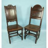Two 17th century oak chairs, each with panel back and solid seat, the front legs joined by