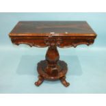 A William IV rosewood fold-over card table on octagonal baluster column and circular base, with four