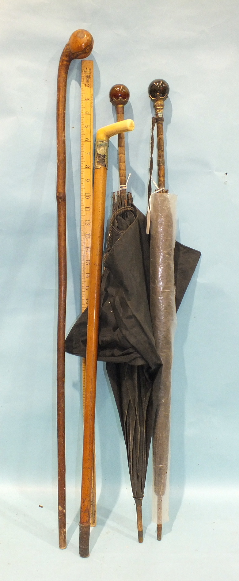 Two Late-Victorian umbrellas with gilt metal and agate ball handles and other sticks. - Image 2 of 3