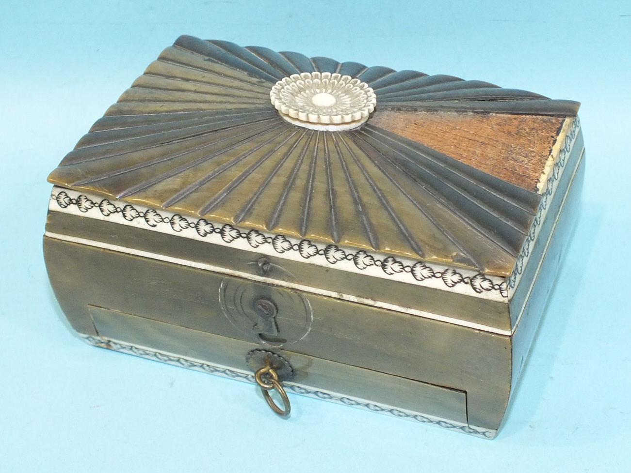 A 19th century horn and Visagapatam small work box of casket form, the hinged lid and fitted