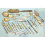 A French silver sifter spoon of lobed form, a French silver pastry slice and other white metal and