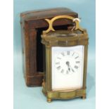 A 20th century French brass carriage timepiece with white enamel dial, 15cm high, including handle