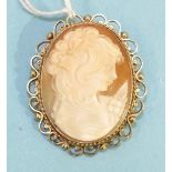 A modern 9ct gold mounted cameo brooch depicting a young girl, in scrolling mount, 4.3cm x 3.4cm,